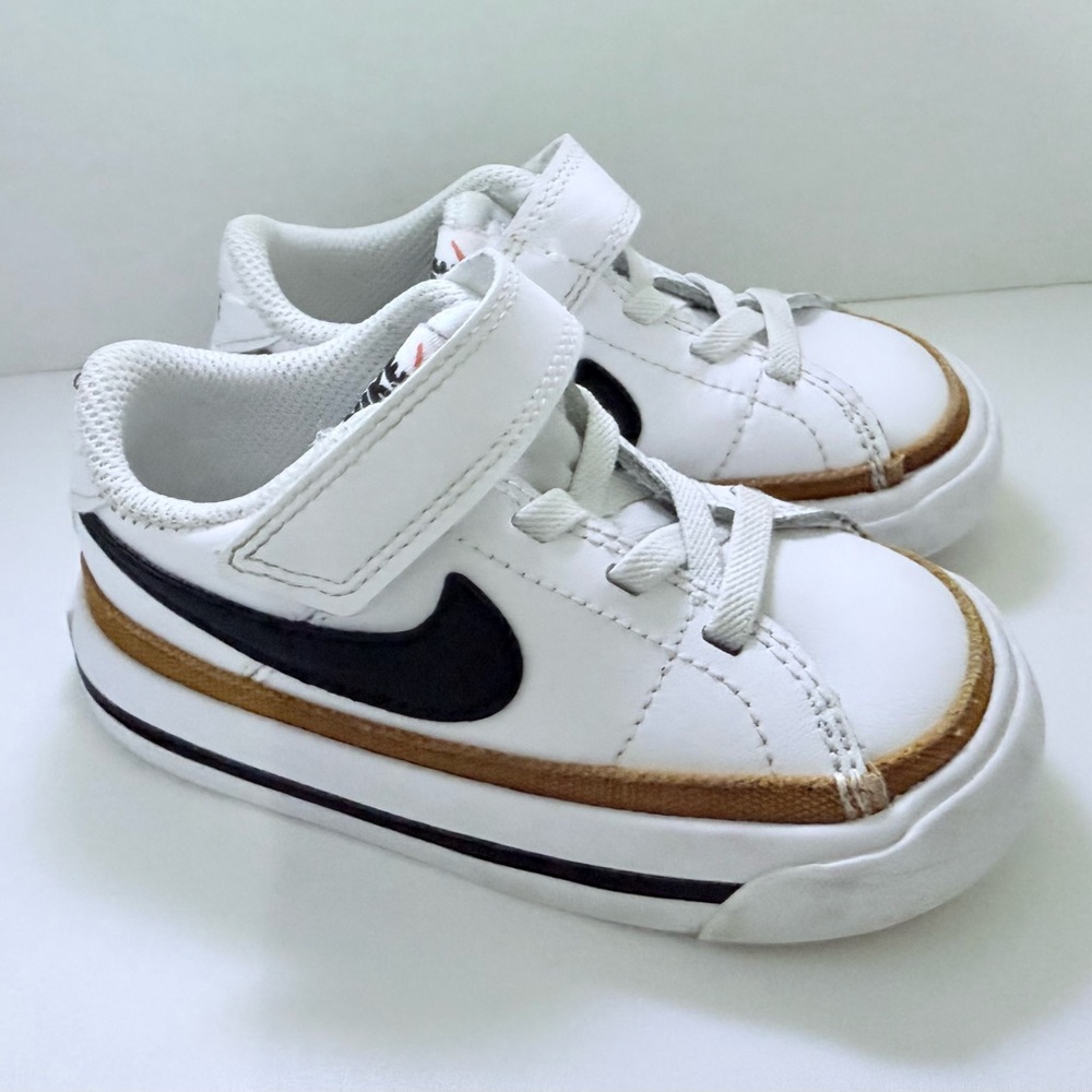Nike Kids White Sneakers with Black Swoosh and Brown Trim